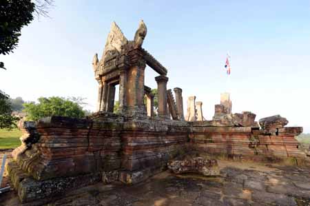 Cambodian National flag is erected on the ancient ruins of the Preah Vihear Temple at the disputed border area of Cambodia and Thailand Oct. 19, 2008. The Preah Vihear Temple was historically claimed sovereignty by both Cambodia and Thailand. The International Court of Justice in 1962 ruled it to Cambodia. In July 2008, tensions ran high between the two countries after the ancient Temple was awarded world heritage status by UNESCO. [Xinhua]