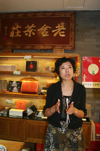 Yin Zhiyun, general manager of Laoshe Teahouse said the teahouse will spare no effort in promoting traditional Chinese culture encouraged by its new title as a Showcase of China's Cultural Industry on Monday, October 20, 2008. [Photo: CRIENGLISH.com] 