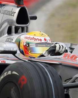 McLaren Mercedes driver Lewis Hamilton of Britain takes a corner on his way to winning the Chinese Formula One Grand Prix at the Shanghai Circuit, in Shanghai, China.[AP Photo] 