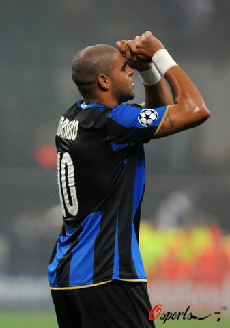 Adriano celebates after he socred at a Goup B match of Champions League against Anorthosis Famagusta on October 22, 2008. Inter Milan won 1-0.