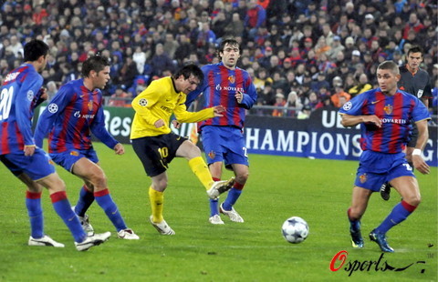 Lionel Messi (C) shoots at Barcelona's Champions League match against FC Basel yesterday. Barcelona won 5-0.
