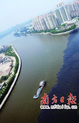 The southern Guangzhou section of the Pearl River is distinctively polluted by black water on Monday, October 20, 2008. 