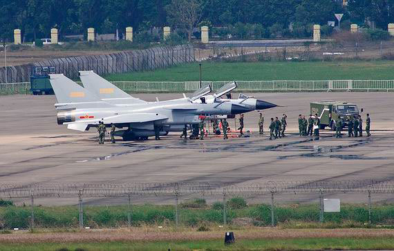 Two F-10 jet fighters parked at Zhuhai Airport on Wednesday, October 22, 2008. [Photo: Global Times] 
