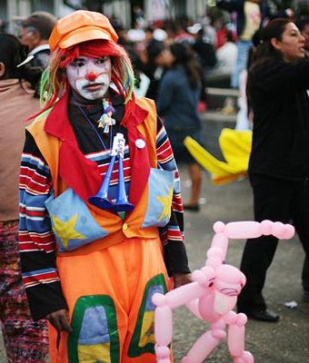 Clowns bring smiles to Mexico City. [Telegraph]