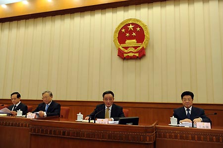 Wu Bangguo (R2), chairman of the Standing Committee of the National People's Congress (NPC) of China, presides the first plenary of the fifth session of the Standing Committee of the 11th National People's Congress (NPC) at the Great Hall of the People in Beijing, capital of China, Oct. 23, 2008.