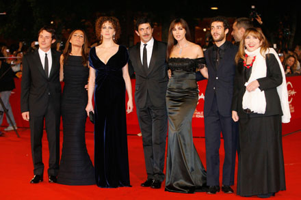 (L to R) The cast of the movie 'L'Uomo che ama' (The Man Who Loves) actor Michele Alhaique, movie director Maria Sole Tognazzi, actors Ksenia Rappoport, Pierfrancesco Favino, Monica Bellucci, Glenn Blackhall and Piera Degli Esposti pose on the red carpet at the film's premerie at the Rome Film Festival October 23, 2008.