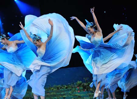 Dancers perform during a performance called 'The Night of Southeast Asia', which is a part of the Nannning International Folk Song Arts Festival, in Nanning, capital of southwest China's Guangxi Zhuang Autonomous Region, Oct. 23, 2008.