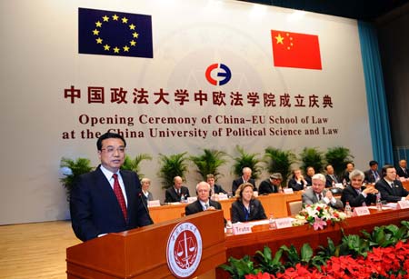 Chinese Vice Premier Li Keqiang (L) addresses the opening ceremony of China-EU School of Law at the China University of Political Science and Law in Beijing, China, on Oct. 24, 2008.