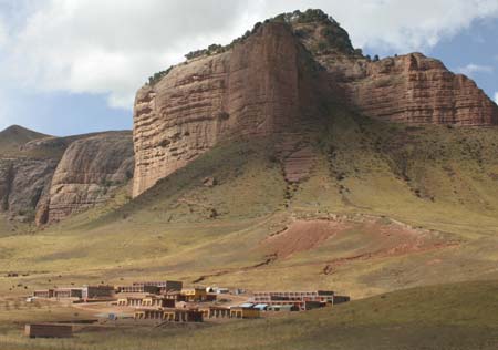 Photo taken on Oct. 17, 2008, shows the Lajia girls school standing under the feet of a hill in Golog Tibetan Autonomous Prefecture of Qinghai Province. The girl school founded in 2005 has made more than 300 Tibetan girls fulfill their 