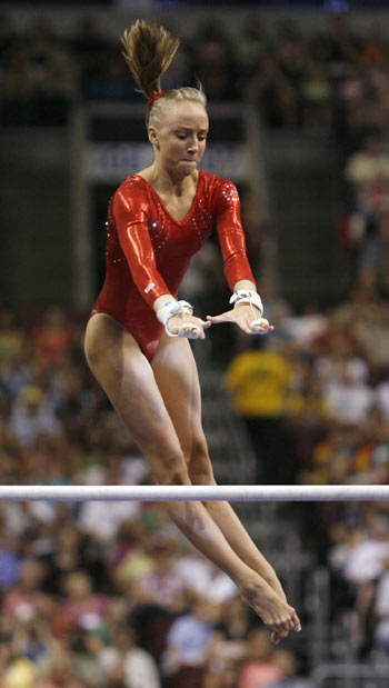 Gymnast Nastia Liukin does her routine on the uneven parallel bars at the 2008 U.S. Olympic gymnastics team trials in Philadelphia, Pennsylvania June 22, 2008.