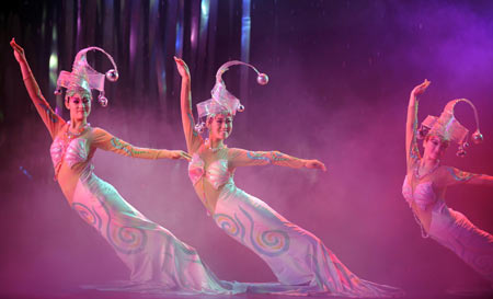 Actresses perform a song and dance show entitled 'Butterfly Dream' in Dali, southwest China's Yunnan Province on Oct. 27, 2008.