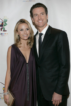 Actress Jennifer Siebel and her husband, San Francisco Mayor Gavin Newsom, arrive for a staged reading of 