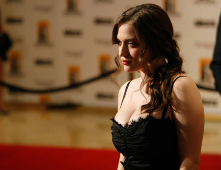 Actress Kat Dennings poses at the 12th annual Hollywood Awards gala in Beverly Hills, California October 27, 2008.