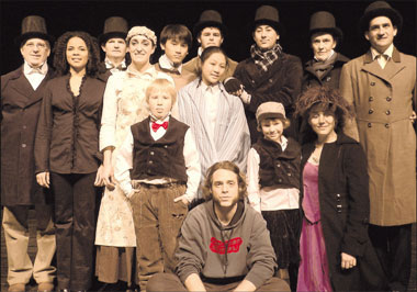 Canadian theater director Jonathan Geenen (front) with his East West Theater actors.