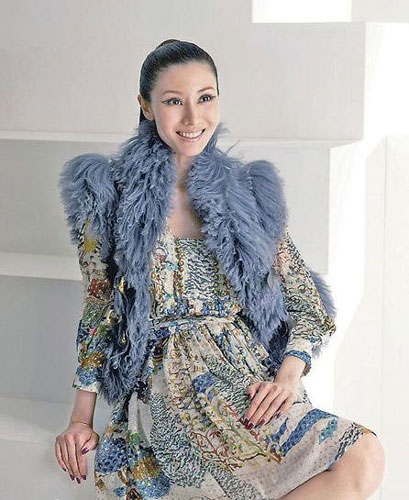 Michele Lee is seen in a photo ad for the opening of a shopping plaza in Dalian, the fashion city in northeast China.