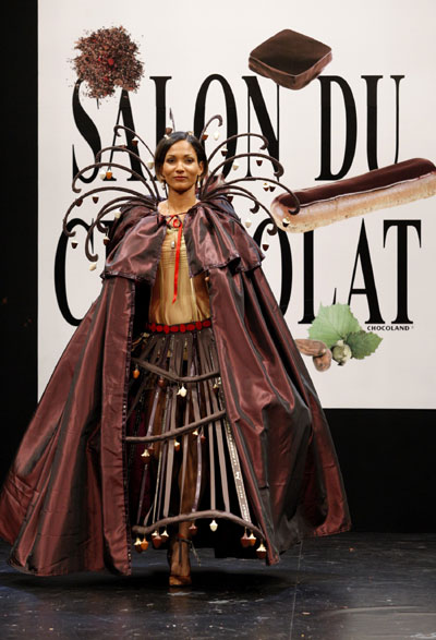 France's Athletic Christine Arron presents a creation by Boucheron and La Maison du Chocolat at the 14th Salon du Chocolat (Paris Chocolate Show) in Paris October 28, 2008.