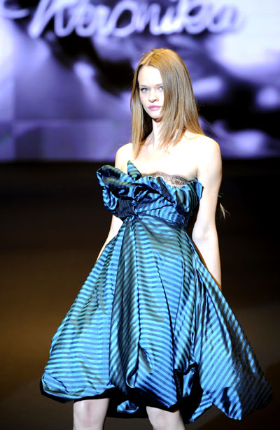  A model presents part of the women's 2009 collection 'For Weronika' by Polish fashion designer Teresa Rosati during a fashion show at Warsaw Polytechnic building in Warsaw, October 28, 2008.