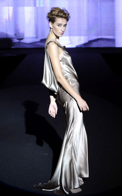 A model presents part of the women's 2009 collection by Polish fashion designer Teresa Rosati during a fashion show at Warsaw Polytechnic building in Warsaw, October 28, 2008.