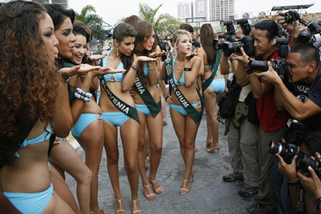 Miss Earth 2008 contestants pose for photographers during media presentations in Manila October 28, 2008. Eighty-five beauties from around the world declared their personal environmental campaigns, with the theme for this year's competition focused on 'green lifestyle'. 