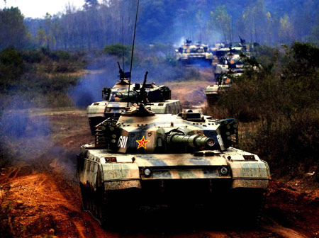 Armored vehicles participate an attacking drill in Central China's Henan Province October 28,2008. The armored brigade stationed in Jinan of East China's Shandong Province conducted a filed operation on attacking in mountainous area. [Asiannewsphoto]