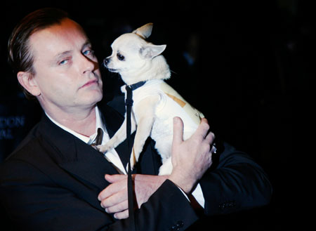 Fizz the Dog and Director Stephan Elliott arrive for the premiere of 'Easy Virtue' in Leicester Square, London October 28, 2008.