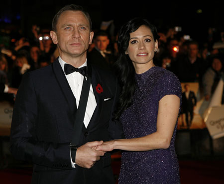 British actor Daniel Craig and his partner Satsuki Mitchell, arrive for the world premiere of the latest James Bond movie 'Quantum of Solace' at Leicester Square in London October 29, 2008.