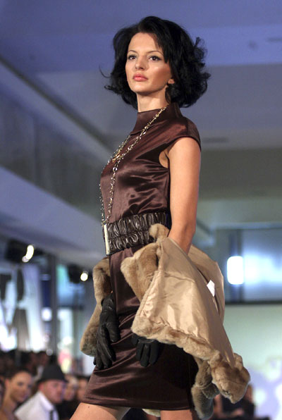  A model presents a creation during Albania's Supermodel contest in Tirana October 29, 2008. Supermodel of the World contest will be held in Budva, Montenegro in January 2009.