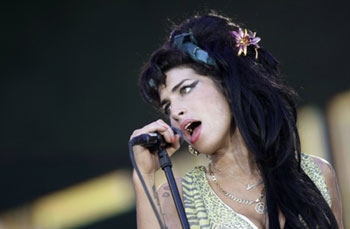 British singer Amy Winehouse performs during the 'Rock in Rio' music festival in Arganda del Rey, near Madrid, July 4, 2008. 