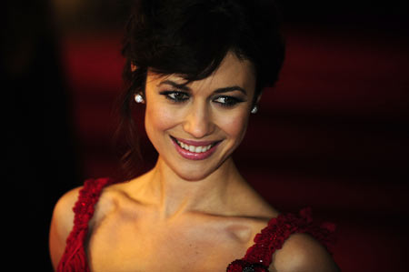 Ukrainian actress Olga Kurylenko arrives for the world premiere of the latest James Bond movie &apos;Quantum of Solace&apos; at Leicester Square in London October 29, 2008. [Xinhua/Reuters]