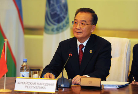 Chinese Premier Wen Jiabao on Thursday called on member countries of the Shanghai Cooperation Organization (SCO) to work in concert to improve the bloc's capability in dealing with the risks brought about by the current global financial crisis.