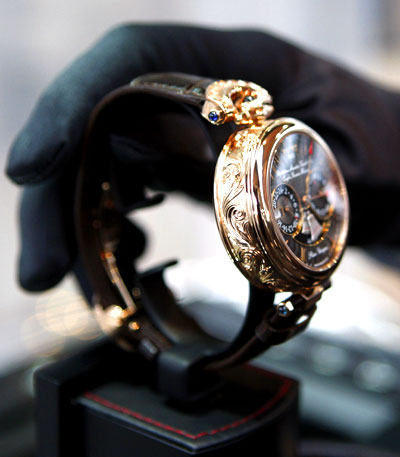 A 475,000 euros gold watch is displayed before the opening of the Grand Luxe exhibition in Brussels, October 30, 2008.