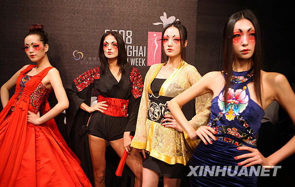 Models present creations during the opening ceremony of the 2008 Shanghai Fashion Week. 