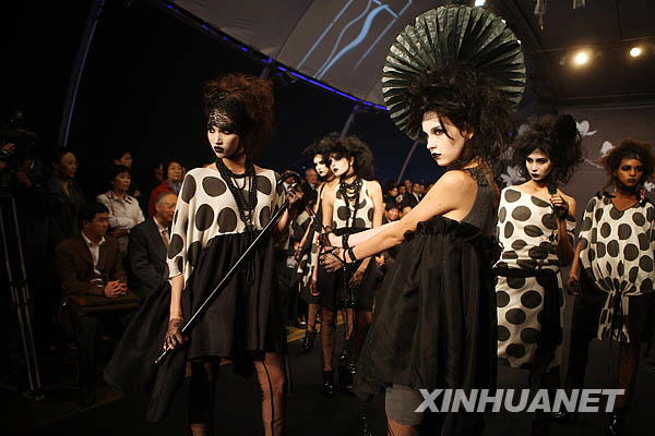 Models present creations during the opening ceremony of the 2008 Shanghai Fashion Week. 