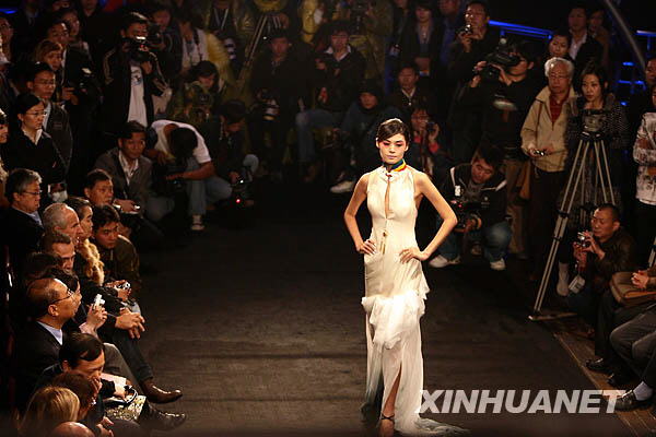 A model presents a creation during the opening ceremony of the 2008 Shanghai Fashion Week. 