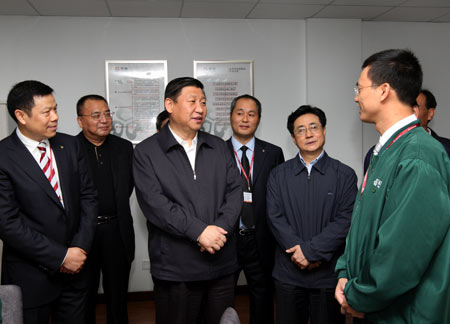 Chinese Vice President Xi Jinping (3rd L), member of the Standing Committee of the Political Bureau of the Communist Party of China (CPC) Central Committee, inspects Youkang food group in Hangzhou, capital of east China's Zhejiang Province, Oct. 31, 2008. Xi Jinping has called for enhanced rural reform, food safety and development of small and medium-sized enterprises (SME) during an inspection of the eastern Zhejiang Province.[Xinhua]