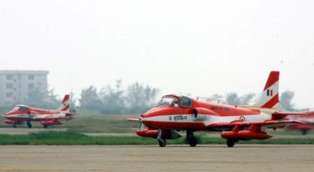 Planes of Suryakiran, or sun rays in Hindi, an aerobatics demonstration team of the Indian Air Force, arrive in Zhuhai, south China's Guangdong Province, Oct. 31, 2008. Twelve planes of Surya Kiran aerobatics demonstration team arrived in Zhuhai on Friday to attend the 7th China Int'l Aviation and Aerospace Exhibition slated for Nov. 4 to 9. 