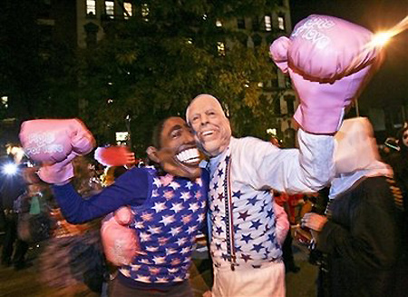 Participants dressed as presidential candidates Sen. Barack Obama, left, and Sen. John McCain, take part in Greenwich Village&apos;s Halloween parade, Friday, Oct. 31, 2008 in New York. [Agencies]