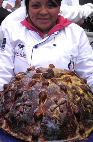 A big piece of "dead bread" is shown at the Zocalo square during a bread-making contest special for the day of the dead in Mexico city Nov. 2, 2008.