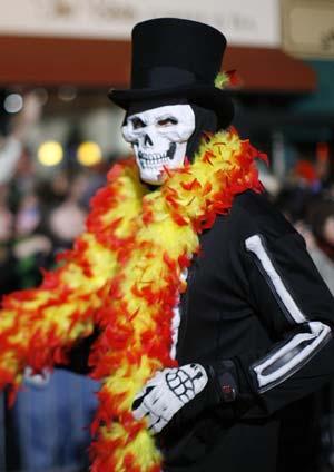 A reveler marches in the annual Greenwich Village Halloween Parade in New York, October 31, 2008. 