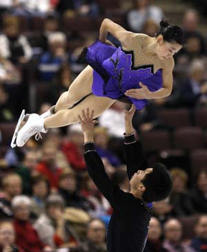 China's Huibo Dong (top) and Yiming Wu compete in the pairs free skate during Skate Canada International figure skating competition in Ottawa November 1, 2008.