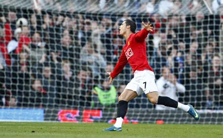 Manchester United's Cristiano Ronaldo celebrates after scoring during their English Premier League soccer match against Hull City in Manchester, northern England, November 1, 2008. 