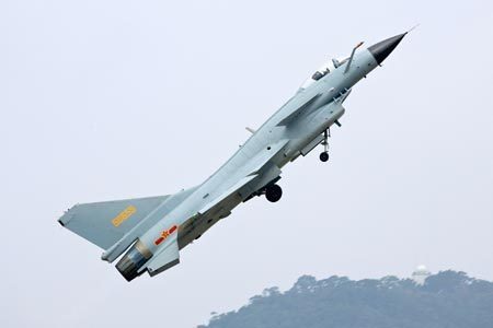 This photo taken on October 25 shows an F-10 jet fighter taking off during a training for the upcoming 7th China International Aviation and Aerospace Exhibition, which is scheduled to open in Zhuhai, Guangdong Province from November 4 to 9, 2008. A series of new missiles, weapons and China's homegrown CH-3 unmanned fighter plane will make their public debut at the exhibition. [CFP] 