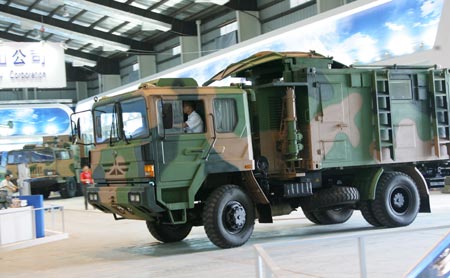 A Missile launcher vehicle is seen on exhibition before the upcoming 7th China International Aviation and Aerospace Exhibition in Zhuhai, Guangdong Province, in this picture taken on October 31, 2008. A series of new missiles, weapons and China's homegrown CH-3 unmanned fighter plane will make their public debut at the exhibition, which is scheduled to open from November 4 to 9, 2008. [Xinhua]