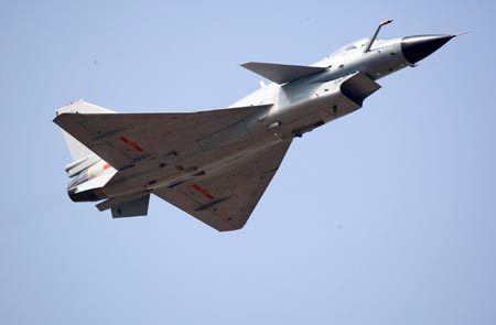 This photo taken on October 27 shows an F-10 jet fighter taking part in a training for the upcoming 7th China International Aviation and Aerospace Exhibition, which is scheduled to open in Zhuhai, Guangdong Province from November 4 to 9, 2008. A series of new missiles, weapons and China's homegrown CH-3 unmanned fighter plane will make their public debut at the exhibition. [CFP] 