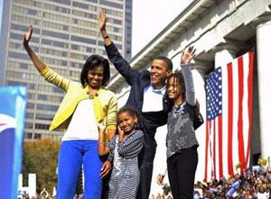 US Democratic presidential candidate Illinois Senator Barack Obama, his wife Michelle and daughters, wave during a rally at Ohio State House in Columbus, Ohio.[Emmanuel Dunand/AFP] 