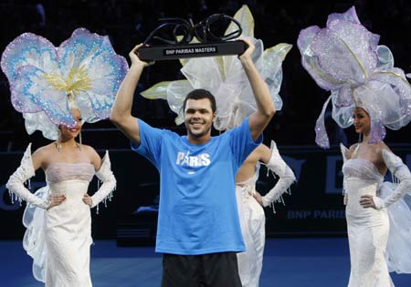 Jo-Wilfried Tsonga of France holds his trophy after defeating David Nalbandian of Argentina in the final match of the Paris Tennis Masters tournament, Sunday, Nov. 2, 2008. Tsonga defeated Nalbandian 6-3, 4-6, 6-4.