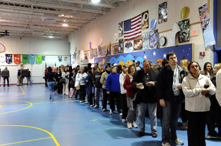 Voters queue to cast their ballots in Arlington, Virginia of the United States on Nov. 4, 2008. Voters in Virginia kicked off the day-long polling in the U.S. presidential elections Tuesday to cast their votes for a new president.