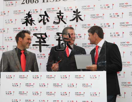 The three players compare Chinese Calligraphy skills and share a laugh at each others espense.