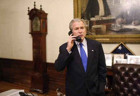 President George W. Bush speaks with President-elect Senator Barack Obama (D-IL) during a congratulatory phone call from the Treaty Room at the White House November 4, 2008.