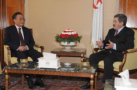 Wu Bangguo (L), chairman of the Standing Committee of China&apos;s National People&apos;s Congress, meets with Algerian Prime Minister Ahmed Ouyahia in Algiers, capital of Algeria, on Nov. 5, 2008.